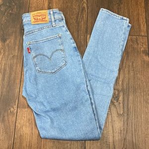 Levi’s 721 skinny jeans distressed